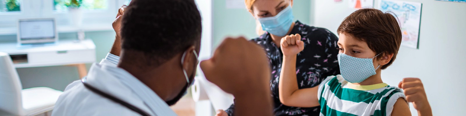 doctor and child celebrating